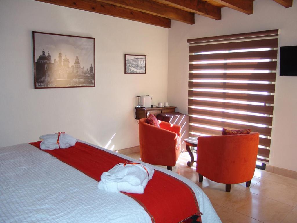 Casa Del Tio Hotel Boutique Альенде Номер фото A room at the hotel